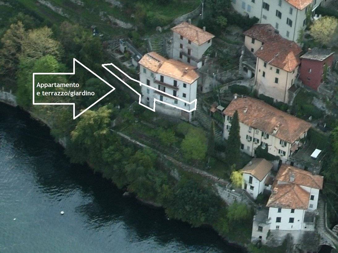 Nesso, apartment with garden and lake view